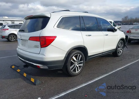 2016 Honda Pilot Elite z USA, uszkodzony, nr VIN 5FNYF6H01GB106574